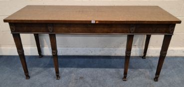 AN EDWARDIAN MAHOGANY RECTANGULAR SERVING TABLE, with a single frieze drawer, raised on square