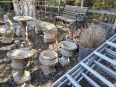 A SELECTION OF GARDEN POTS, to include a pair of weathered concrete urns, a singular urn, a glazed
