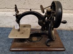 WILLCOX AND GIBBS, SEWING MACHINE COMPANY, NEW YORK, A CAST IRON HAND-OPERATED SEWING MACHINE, on