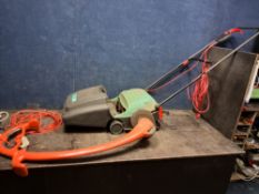A FLYMO REVOLUTION 2000 STRIMMER and a Bosch ASM32F lawn mower (both PAT pass and working, but the