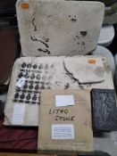 A SMALL GROUP OF LITHOGRAPHIC AND PRINTING ITEMS including two large stones with remnants of print