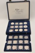 A box containing two trays of 12 Crown-sized coins, 21 x Kings and Queens of England series.
