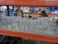 A LARGE QUANTITY OF MOSTLY CUT GLASS AND CRYSTAL DRINKING VESSELS to include champagne flutes,