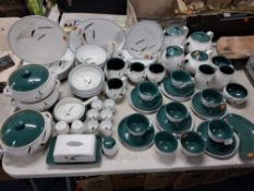 A SEVENTY ONE PIECE DENBY GREENWHEAT DINNER SERVICE, comprising three tureens, a meat plate, a