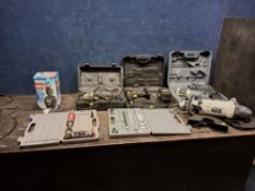 A COLLECTION OF POWER TOOLS including a MacAllister angle grinder, a Hitachi 1/4in router in case,