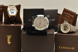 TWO 'EARNSHAW' WRISTWATCHES AND A TRAVEL CLOCK, automatic movement, skeletion dials, together with