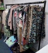A QUANTITY OF LADIES CLOTHES, approximatly seventy-five items, to include dresses, skirts, coats and
