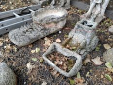 TWO WEATHERED COMPOSITE GARDEN ORNAMENT PLANTERS, one of a large boot and the other a tractor Qty: 2