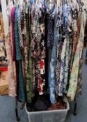 A QUANTITY OF LADIES DRESSES SKIRTS AND LEGGINGS ETC. approximatly sixty items, to include various