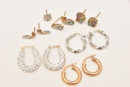 AN ASSORTMENT OF EARRINGS, to include a pair of small hollow yellow metal hoops stamped 375 Itailian