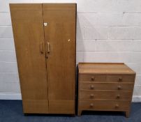 AN EARLY 20TH CENTURY OAK DOUBLE DOOR WARDROBE, along with a chest of two short over three long