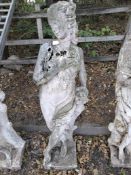 A WEATHERED CONCRETE FEMALE GARDEN STATUE, height 138cm Condition Report:appears in good