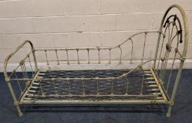 A FRENCH STEEL AND COPPER FOLDING CHILD'S BED Dimensions:length 163cm x depth 70cm x height 107cm