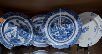 A GROUP OF 19TH CENTURY BLUE AND WHITE PLATES, comprising a earthenware plate which shares