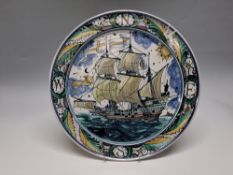 EDGAR CAMPDEN FOR ALDERMASTON POTTERY: A ROANOKE COMMEMORATIVE CHARGER, painted in muted tones