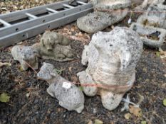 FOUR WEATHERED CONCRETE GARDEN ORNAMENTS, to include a sheep and two lambs, and a pig figure Qty: