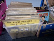 THREE BOXES OF ELVIS PRESLEY RECORDS AND BOOKS containing over seventy Vinyl LP records, nearly