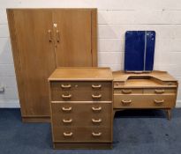 G PLAN, E GOMME, AN EARLY 20TH CENTURY OAK THREE-PIECE BEDROOM SUITE, comprising a double door