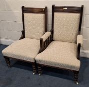 A PAIR OF EARLY 20TH CENTURY LADIES AND GENTS CHAIRS, one with armrests, both with repeating foliate