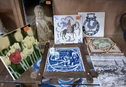 A GROUP OF TILES, comprising a Carter & Co (Poole) handpainted tile from the Coptic Saints series,