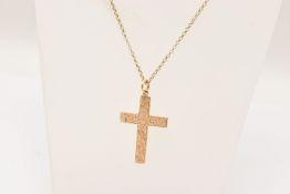 A 9CT GOLD CROSS PENDANT NECKLACE, the cross with scrolling acanthus pattern to the front and a