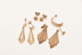 AN ASSORTMENT OF EARRINGS, to include two pairs of yellow metal drop earrings, a pair of knot stud