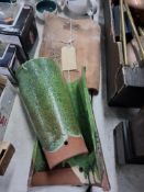 A GROUP OF THREE ROOF TILES two of which are green glazed and the third has a label stating, it's