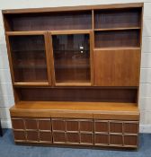 POSSIBLY A.H. McINTOSH & CO LTD, KIRKCALDY, SCOTLAND, A MID-CENTURY TEAK WALL UNIT, fitted with