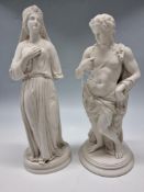 TWO PARIAN WARE FIGURES, comprising a Copeland standing male figure, possibly Bacchus or Dionysus,