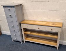 A PAINTED PINE OPEN BOOKCASE, with three drawers, along with a chest of seven drawers Dimensions: