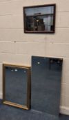 A GILT WOOD RECTANGULAR BEVELLED EDGE WALL MIRROR, along with two other mirrors Dimensions:gilt