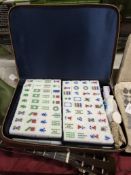 CHINESE MAHJONG TILE SET IN ZIPPERED TRAVEL CASE this travel ready set features crisp, clear, two