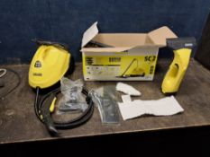 A KARCHER SC-2 STEAM CLEANER in original box with some accessories (PAT pass and working) and a