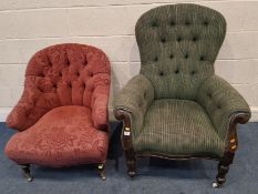 A LATE VICTORIAN GREEN UPHOLSTERED BUTTON BACK ARMCHAIR, with scrolle armrests, raised on turned