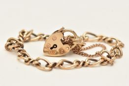 A 9CT YELLOW GOLD BRACELET, figaro chain, fitted with a heart padlock clasp, hallmarked 9ct