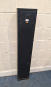 A SLIM METAL GUN SAFE, with a single removable door Dimensions:width 25cm x depth 15cm x height