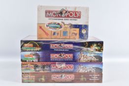 FIVE TRAVEL RELATED MONOPOLY BOARD GAMES, to include a Hasbro International Euro Edition, a