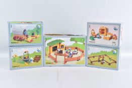 A COLLECTION OF FIVE BOXED SCHLEICH PEYO THE SMURFS PLAYSETS, to include 1994 Smurfettes Bedroom