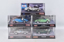 FIVE BOXED CARTRIX GRAND PRIX LEGENDS SLOT CARS WITH CARTRIX MICROFIBER CLOTH, to include a Sealed