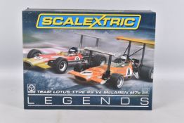 A BOXED SCALEXTRIC LEGENDS MCLAREN M7C VS TEAM LOTUS TYPE 49 SET, No.C3544A, limited edition No.0558