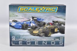A BOXED SCALEXTRIC LEGENDS TYRRELL 003 Vs. TEAM LOTUS TYPE 72e SET, includes a Jackie Stewart
