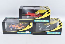 THREE BOXED SCALEXTRIC 1:32 SCALE SLOT CAR MODEL VEHICLE, to include a Caterham 7 Comma No28 in