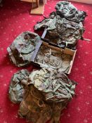 A LARGE ASSORTMENT OF MILITARY CAMOFLAGE BAGS AND BACKPACKS, all appear to be modern, also
