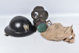 A WWII ERA STEEL HELMET AND A RESPIRATOR, the helment is in good condition and comes with chin strap