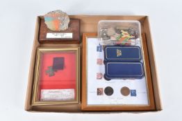 A SELECTION OF MEDALS, BADGES AND STAMPS, also included isi a piece of the Berlin Wall, the medals