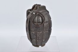 AN INERT WORLD WAR MILLS GRENADE, this is in good condition, the year date appears to be 1915