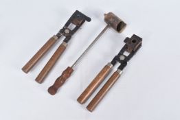 TWO VINTAGE BULLET MOULDS AND A BULLET CASTING LADEL, the bullet molds are 20th century and the