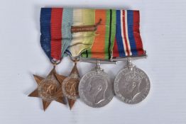 A GROUP OF WWII MEDALS MOUNTED FOR WEARING, these include a 1939-45 star, an Atlantic star with