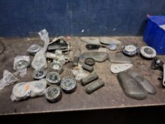 A TRAY CONTAINING VINTAGE MOTORCYCLE PARTS including two pairs of AJS tank knee pads with mounting