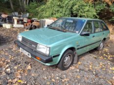 A 1984 NISSAN SUNNY 5 DOOR ESTATE CAR in green, with a 1.5L petrol engine, four-speed gearbox, NO